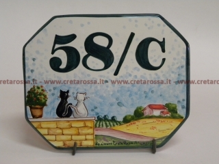 cod.art: nc77 - Mattonella in ceramica cm 16x12 circa, ottagonale e decorata con "gatti sul muretto" e scritta personalizzata. 